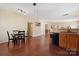 Kitchen with breakfast nook and view into living areas at 1411 Ladora Dr, Charlotte, NC 28262