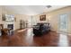 Living room features hardwood floors, fireplace and access to backyard at 1411 Ladora Dr, Charlotte, NC 28262