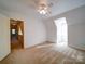 Spacious bedroom with ceiling fan and carpet at 148 Tetbury Ne Ave, Concord, NC 28025