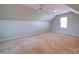 Bonus room featuring light blue walls and carpet at 148 Tetbury Ne Ave, Concord, NC 28025