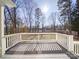 Deck with white railings overlooking a fenced backyard at 148 Tetbury Ne Ave, Concord, NC 28025