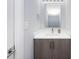 This bathroom features a modern vanity with white countertop and a stylish mirror at 1509 Briar Creek Rd # B, Charlotte, NC 28205