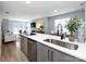 Well-equipped kitchen featuring an island cooktop with an open view to the living room at 1509 B Briar Creek Rd, Charlotte, NC 28205