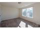 Spacious bedroom with neutral carpeting and large windows at 1540 Striped Bass Ln, Clover, SC 29710