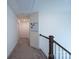 Upstairs hallway with carpet and white walls at 1540 Striped Bass Ln, Clover, SC 29710