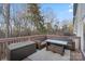 Deck with wicker furniture and wooded views at 1550 Maypine Commons Way, Rock Hill, SC 29732