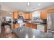 Kitchen with stainless steel appliances and wood cabinets at 1550 Maypine Commons Way, Rock Hill, SC 29732