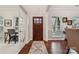 Bright entryway with hardwood floors, and a view into an office at 16341 Autumn Cove Ln, Huntersville, NC 28078