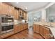 Kitchen with stainless steel appliances and light wood cabinets at 16341 Autumn Cove Ln, Huntersville, NC 28078