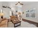 Bright living room with hardwood floors, high ceilings and lots of natural light at 16341 Autumn Cove Ln, Huntersville, NC 28078