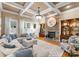 Living room with stone fireplace and built-in shelving at 18621 Rollingdale Ln, Davidson, NC 28036