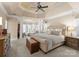 Large main bedroom with plush carpet and sitting area at 18621 Rollingdale Ln, Davidson, NC 28036