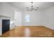 Dining room featuring hardwood floors and fireplace at 203 Linwood Rd, Kings Mountain, NC 28086