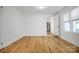 Simple dining area with hardwood floors and kitchen access at 203 Linwood Rd, Kings Mountain, NC 28086