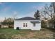 White house exterior with a grassy backyard at 203 Linwood Rd, Kings Mountain, NC 28086