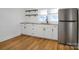 Modern kitchen with white cabinets and granite counters at 203 Linwood Rd, Kings Mountain, NC 28086