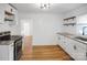 Updated kitchen, white cabinets, granite countertops at 203 Linwood Rd, Kings Mountain, NC 28086