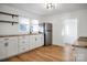 Modern kitchen with white cabinets and granite counters at 203 Linwood Rd, Kings Mountain, NC 28086