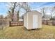 Exterior shot of a convenient storage shed in the backyard, perfect for storing tools and equipment at 208 Lakewood Ave, Charlotte, NC 28208