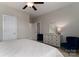 Bedroom with dresser, seating, and attached bath at 211 Harbour Place Dr, Davidson, NC 28036