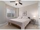 Bedroom with a queen-size bed and ceiling fan at 211 Harbour Place Dr, Davidson, NC 28036