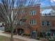 Brick townhome with a staircase and entrance at 211 Harbour Place Dr, Davidson, NC 28036