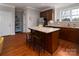 Kitchen features granite countertops and wooden cabinetry at 211 Harbour Place Dr, Davidson, NC 28036