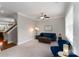 Spacious living room with blue sofa and view of kitchen at 211 Harbour Place Dr, Davidson, NC 28036