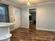 Bright dining area with hardwood floors and view to living room at 235 Linda St, Salisbury, NC 28146