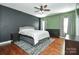 Main bedroom with hardwood floors and ceiling fan at 2610 Lucy Short Cut Rd, Marshville, NC 28103