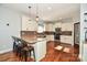 Modern kitchen with granite countertops and hardwood floors at 2610 Lucy Short Cut Rd, Marshville, NC 28103