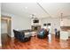 Living room features hardwood floors, fireplace, and open concept at 2610 Lucy Short Cut Rd, Marshville, NC 28103