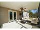 Screened porch with wicker furniture and ceiling fan at 2610 Lucy Short Cut Rd, Marshville, NC 28103