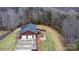 Aerial view of home with large yard and double garage at 277 Archie Mountain Ln, Taylorsville, NC 28681