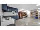 Basement kitchenette with dark cabinets and electric stove at 277 Archie Mountain Ln, Taylorsville, NC 28681