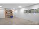 Unfinished basement area with shelving units and storage at 277 Archie Mountain Ln, Taylorsville, NC 28681