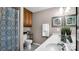 Double vanity bathroom with wood cabinets and a shower at 277 Archie Mountain Ln, Taylorsville, NC 28681