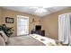 Bright bedroom with a queen bed and window at 277 Archie Mountain Ln, Taylorsville, NC 28681