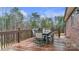 Spacious deck with wooden railings, offering a peaceful backyard view at 277 Archie Mountain Ln, Taylorsville, NC 28681