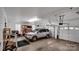 Two-car garage with overhead storage and vehicle at 277 Archie Mountain Ln, Taylorsville, NC 28681