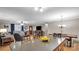 View of kitchen, island, and living room with hardwood floors at 277 Archie Mountain Ln, Taylorsville, NC 28681