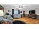 Spacious living room with hardwood floors and stone accent wall at 277 Archie Mountain Ln, Taylorsville, NC 28681