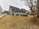 House exterior view, showcasing a backyard with landscaping at 3020 Sewee Ln, Waxhaw, NC 28173