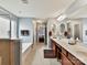 Bathroom with a large vanity, soaking tub, and a view of the bedroom at 3020 Sewee Ln, Waxhaw, NC 28173