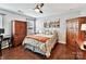 Bedroom with wooden furniture, and ceiling fan at 3020 Sewee Ln, Waxhaw, NC 28173