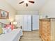 Bedroom with daybed, built-in shelving, and dresser at 3020 Sewee Ln, Waxhaw, NC 28173