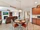 Kitchen dining area with a table and chairs, open to the living room at 3020 Sewee Ln, Waxhaw, NC 28173