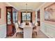 Formal dining room with an oval table and a china cabinet at 3020 Sewee Ln, Waxhaw, NC 28173