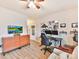 Home office with wood desk, and ceiling fan at 3020 Sewee Ln, Waxhaw, NC 28173