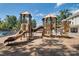 Community playground featuring slides and play structures for outdoor fun, located near the pool at 3020 Sewee Ln, Waxhaw, NC 28173